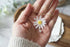 White Daisy Flower with Pearl Necklace