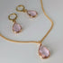 Light Powder Pink Faceted Crystal Teardop Charm Necklace on a Gold Plated Chain