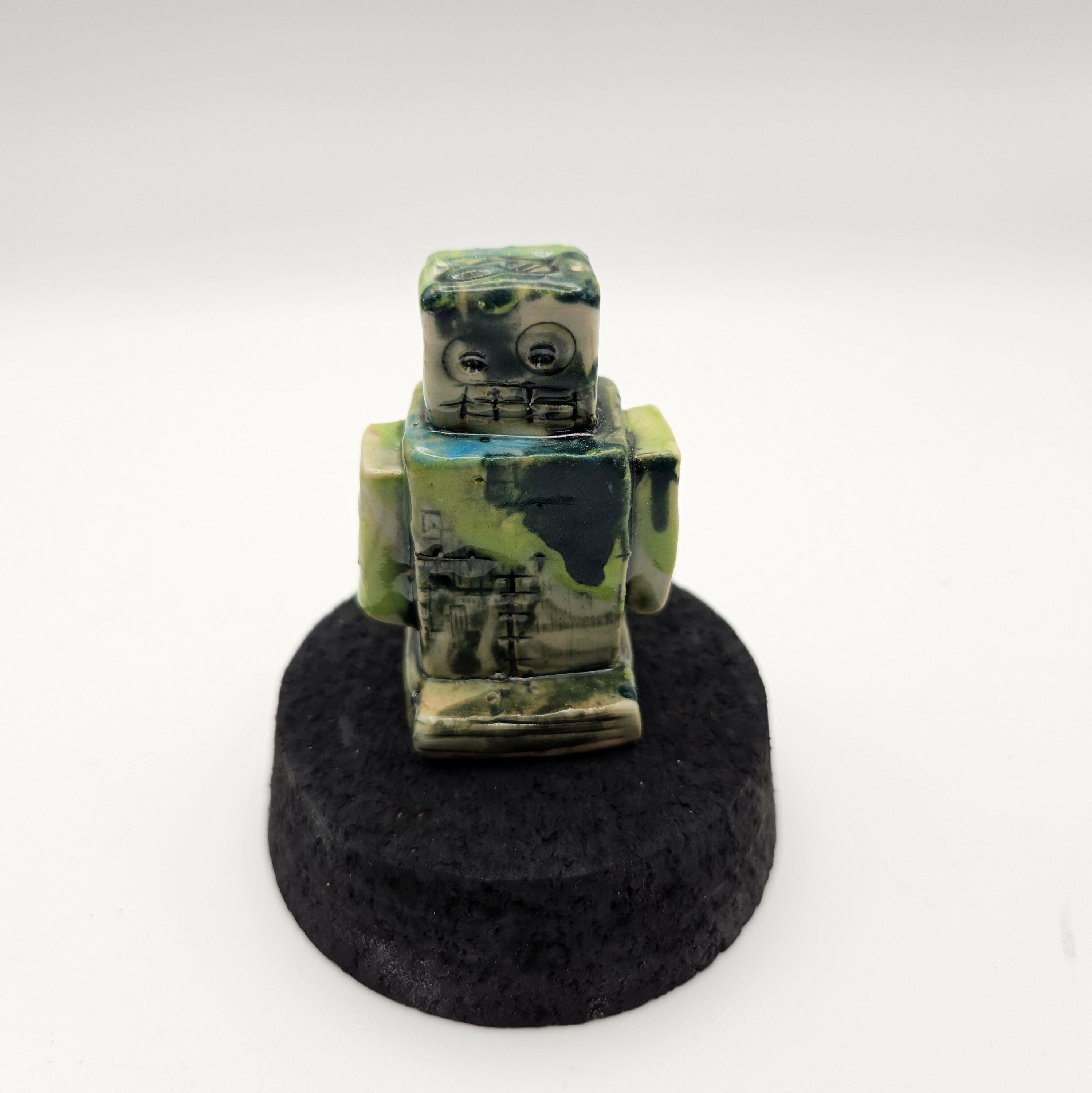 QUIKRY CERAMIC 'MINIBOTS' IN A GLASS CLOCHE