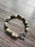 Tibetan Silver Toggle Catch Bracelet with Yellow Jade, Yellow Turquoise & Faceted Grey Hematite.