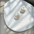 white and sand clay circle