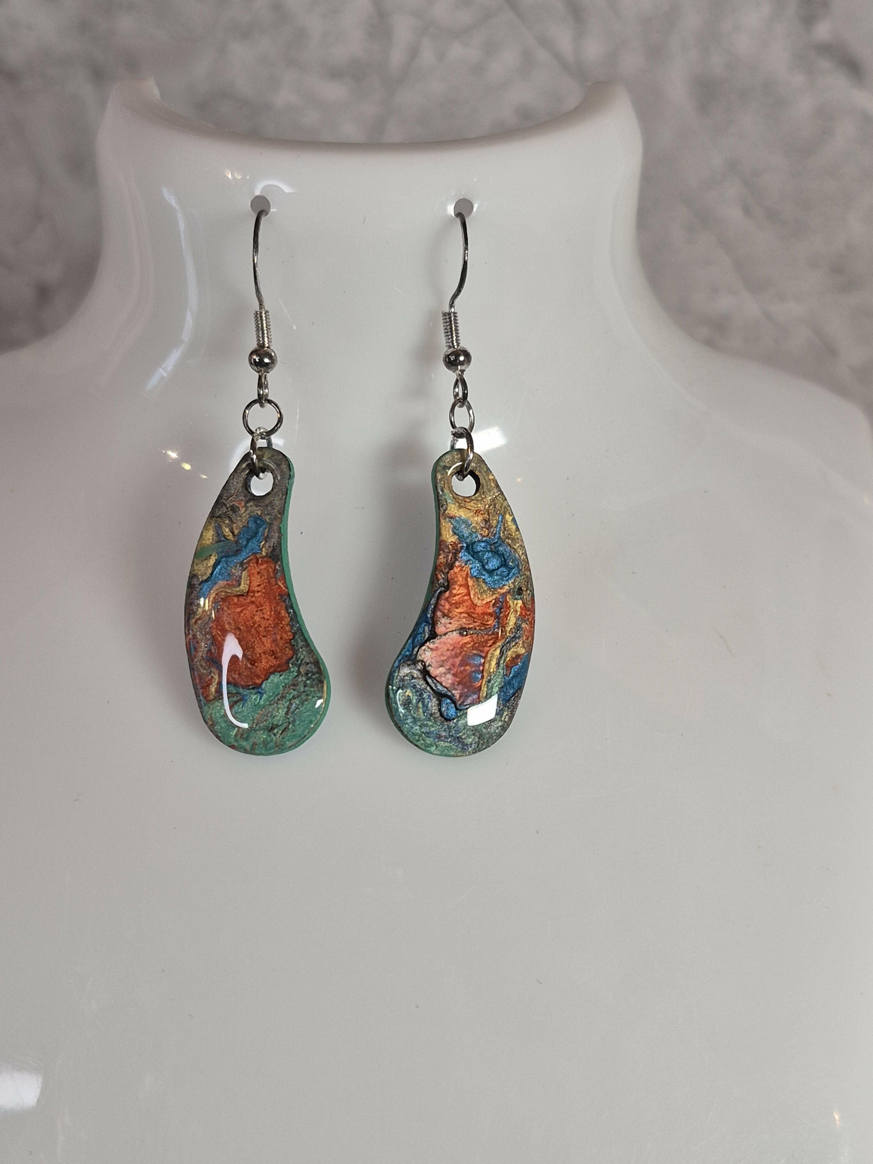 Handcrafted teardrop shaped multicoloured earrings.