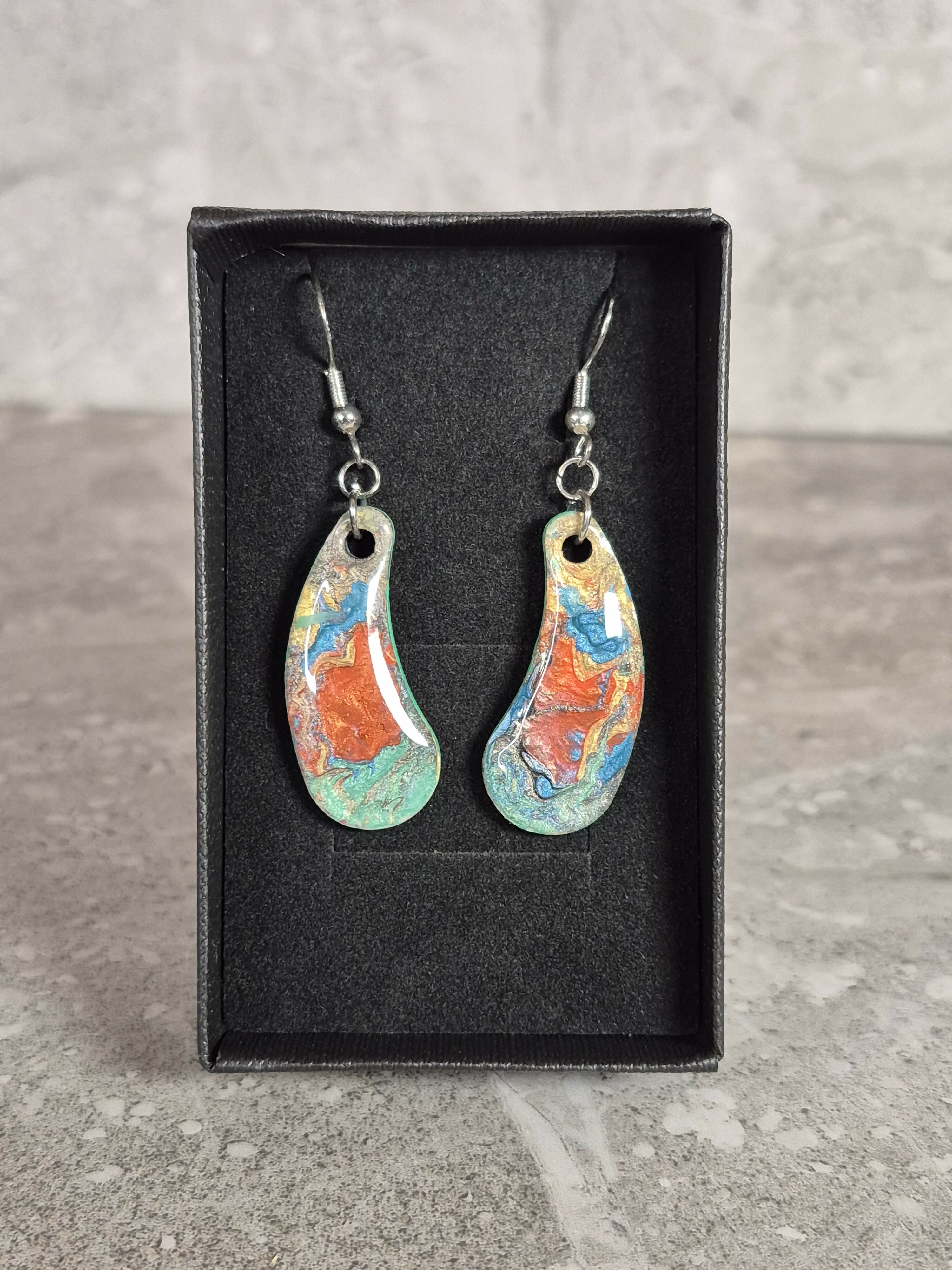 Handcrafted teardrop shaped multicoloured earrings.