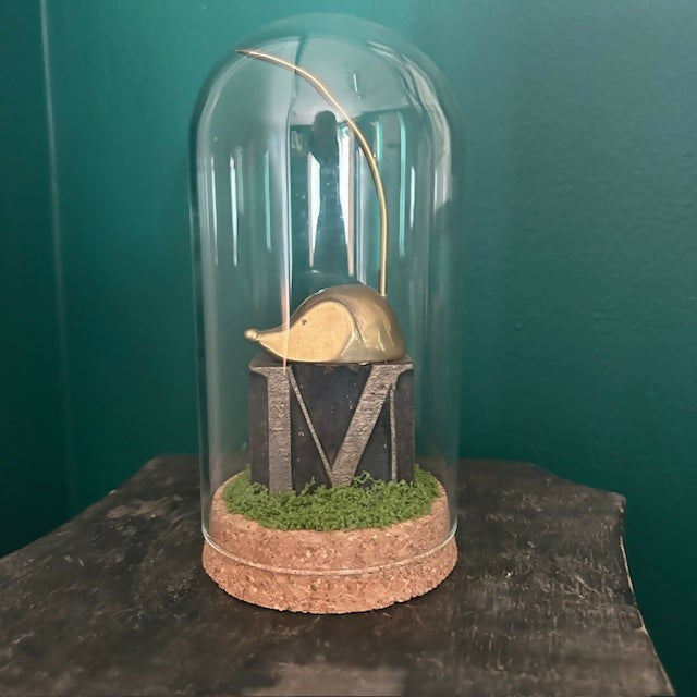 Lovely Glass Dome Featuring A Brass Mouse Sitting On An Antique Letter M Printing Block