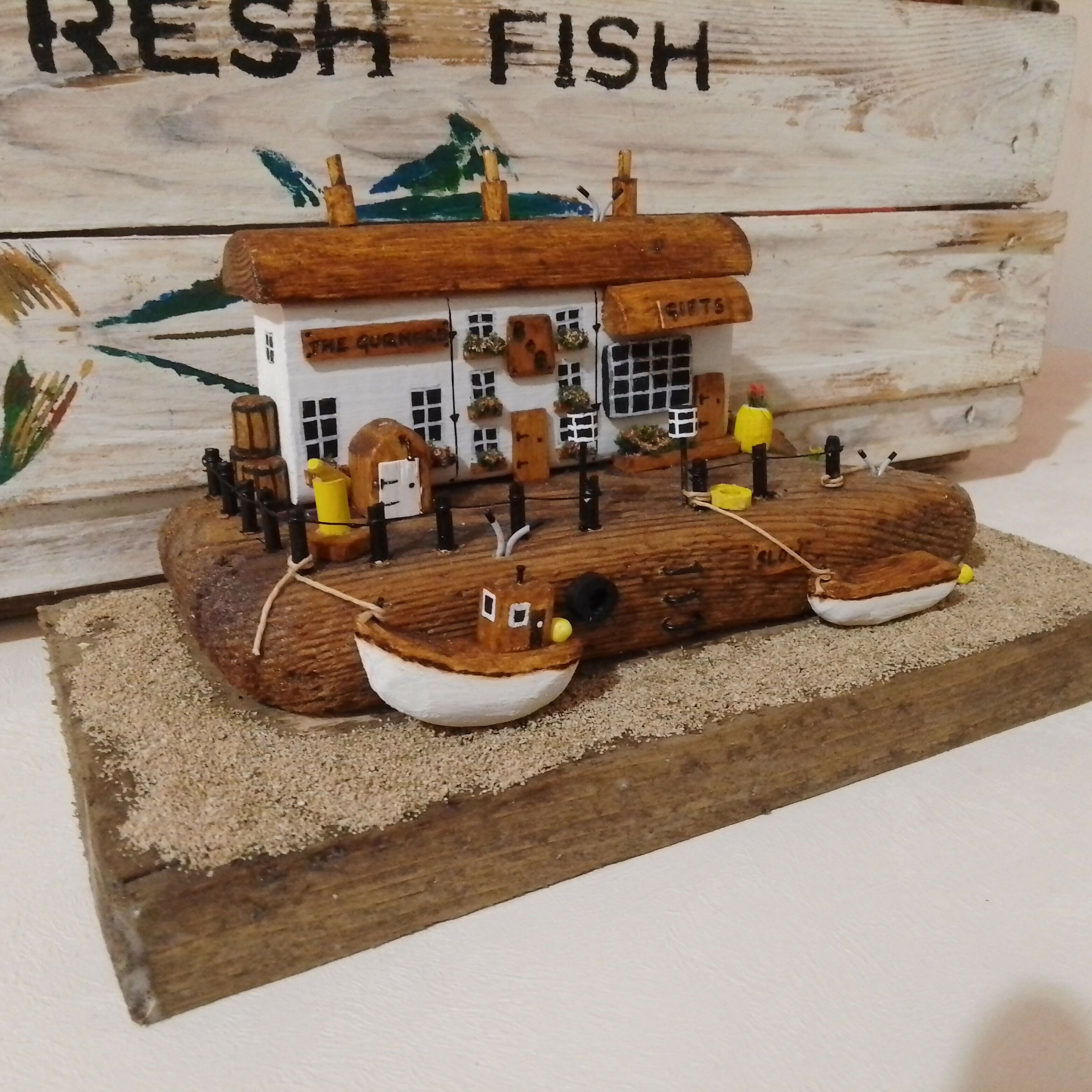 Rustic Harbour Scene: Boats, Pub, B and B, and Chip Shop