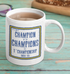 Leeds UTD white mug with blue and yellow 'champions' design.