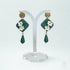 Green Floral Drop Earrings with White Blossoms and Gold Detail