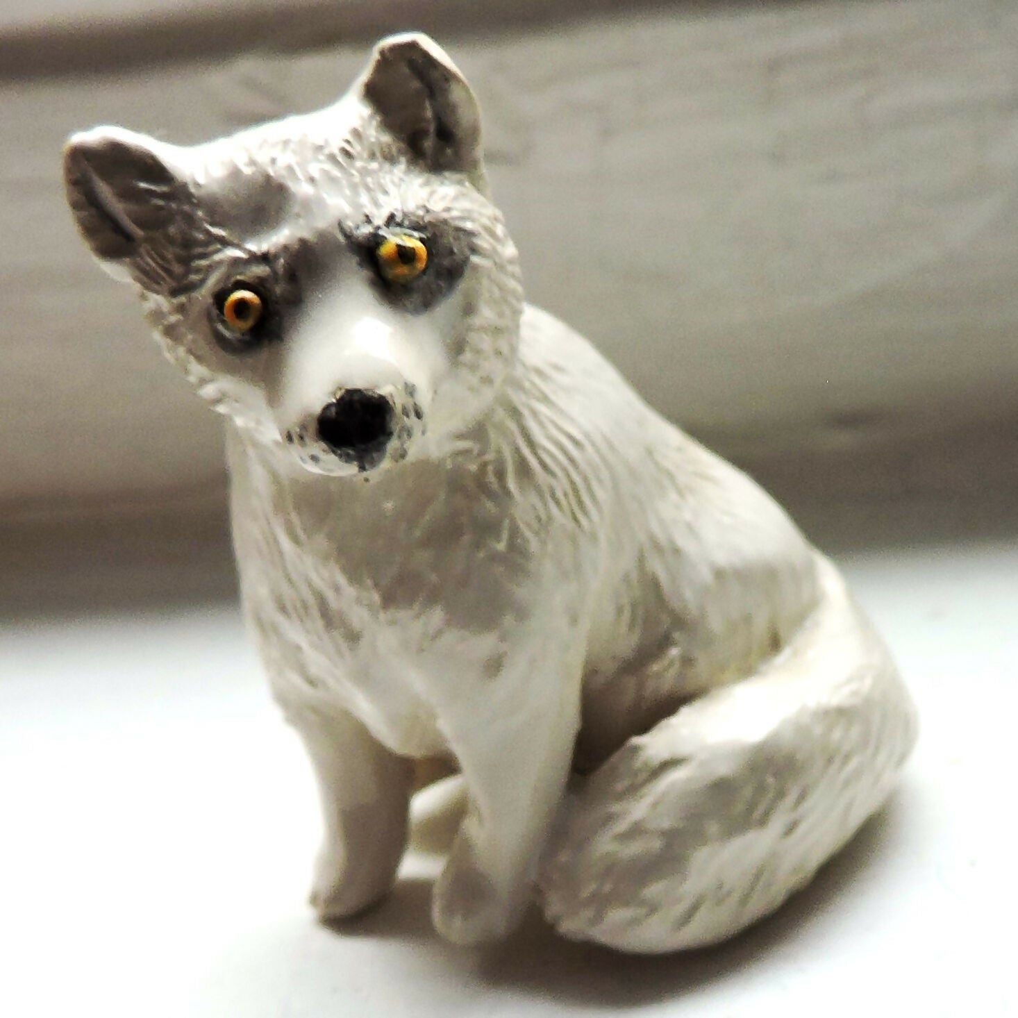 Ceramic Arctic fox sculpture