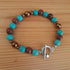 Tibetan Silver Toggle Catch Bracelet with Turquoise, Red Sesame Jasper & Copper Hematite.