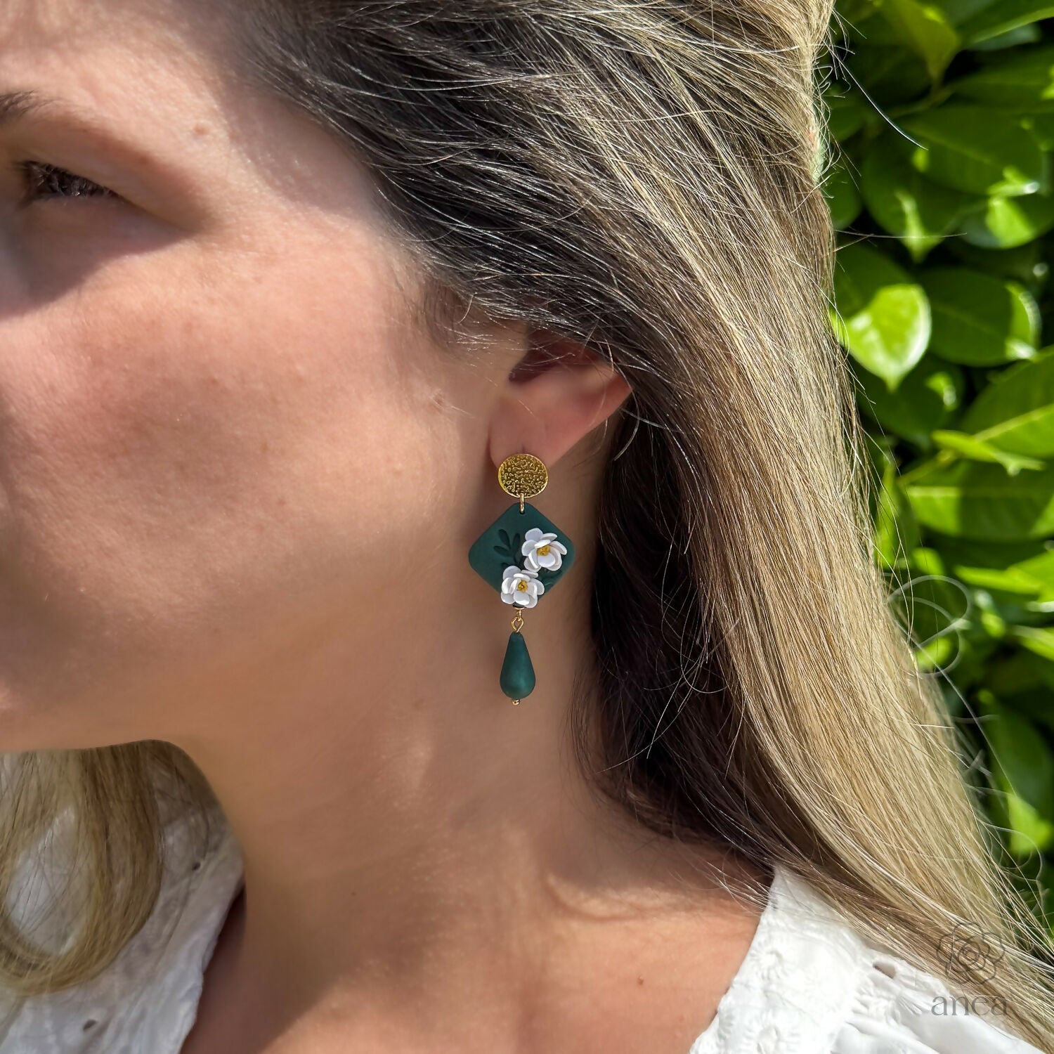 Green Floral Drop Earrings with White Blossoms and Gold Detail
