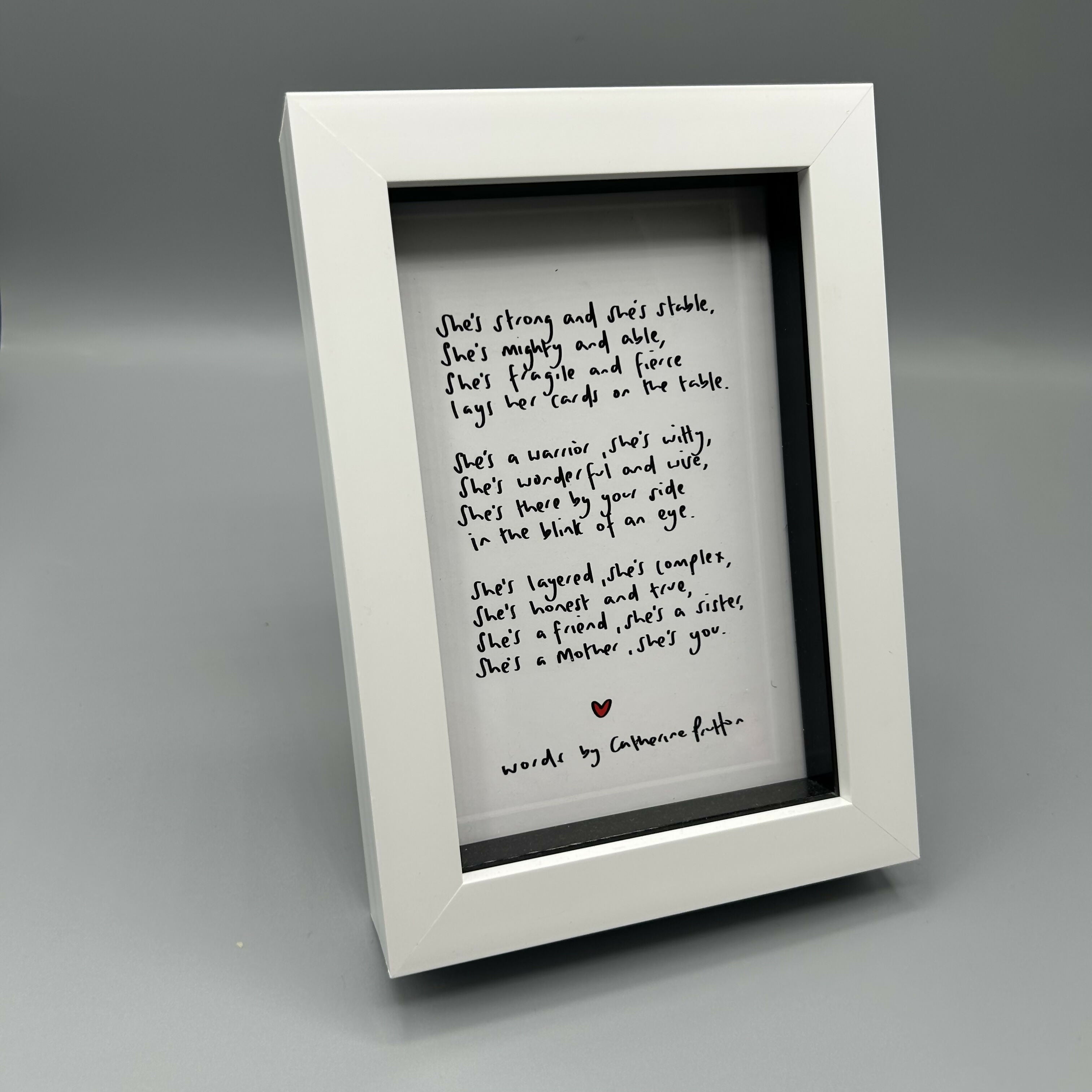 She Framed Poem
