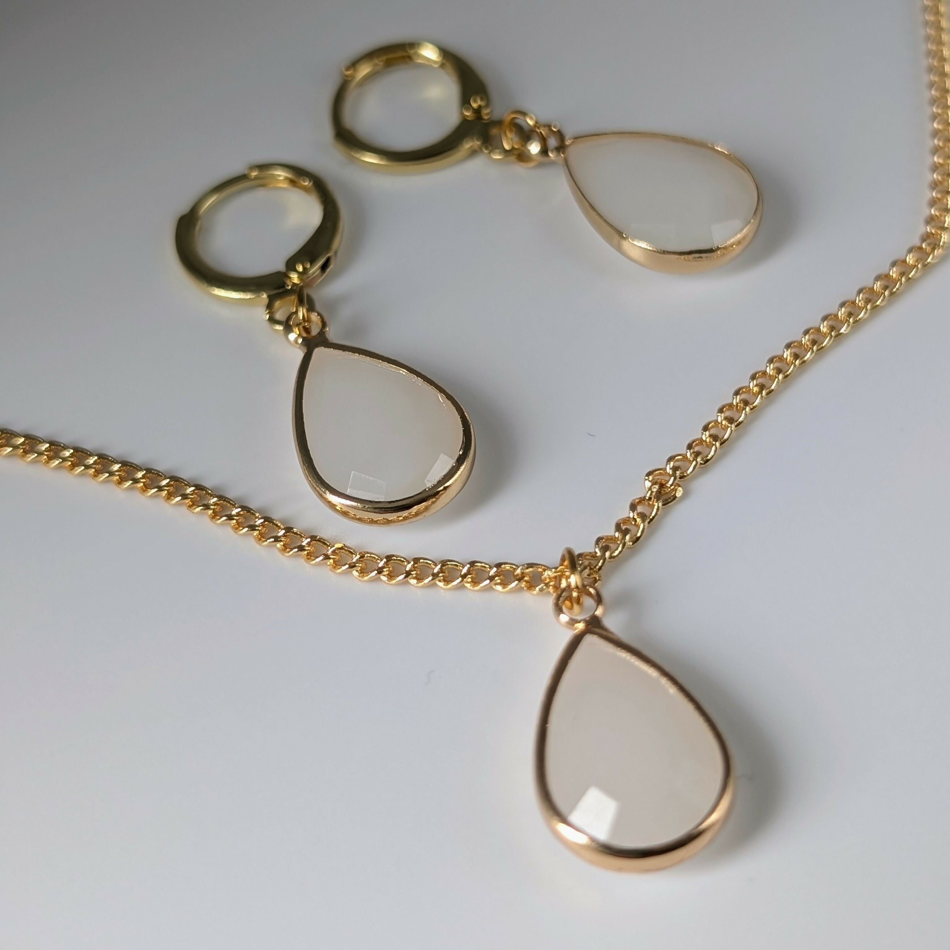 White Jade Faceted Teardop Charm Necklace on a Gold Plated Chain