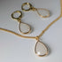 White Jade Faceted Teardop Charm Necklace on a Gold Plated Chain