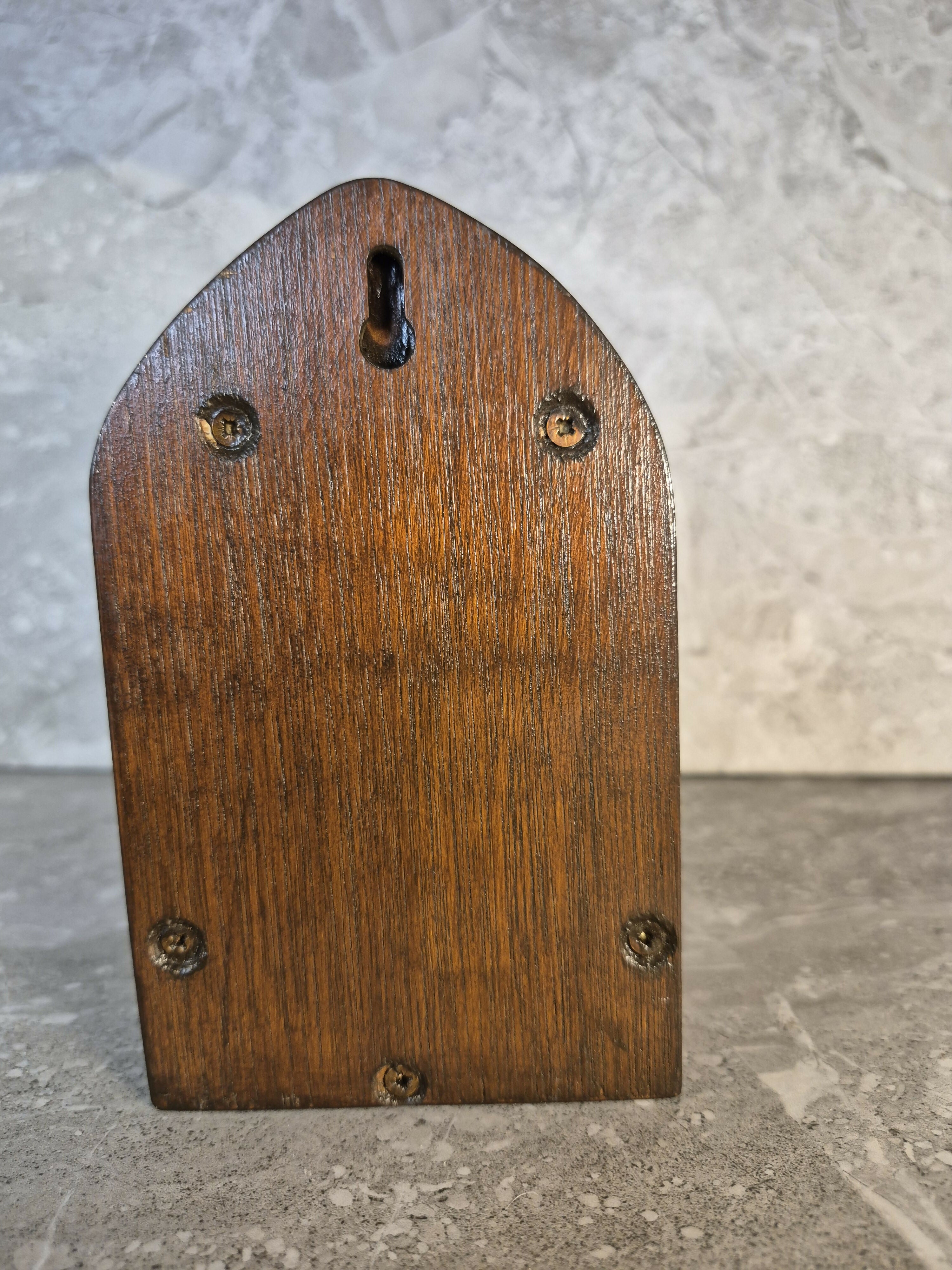 Handcrafted arched wooden fairy door.