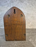 Handcrafted arched wooden fairy door.