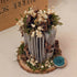 Miniature Brown Floral Arrangement on Wooden Slice