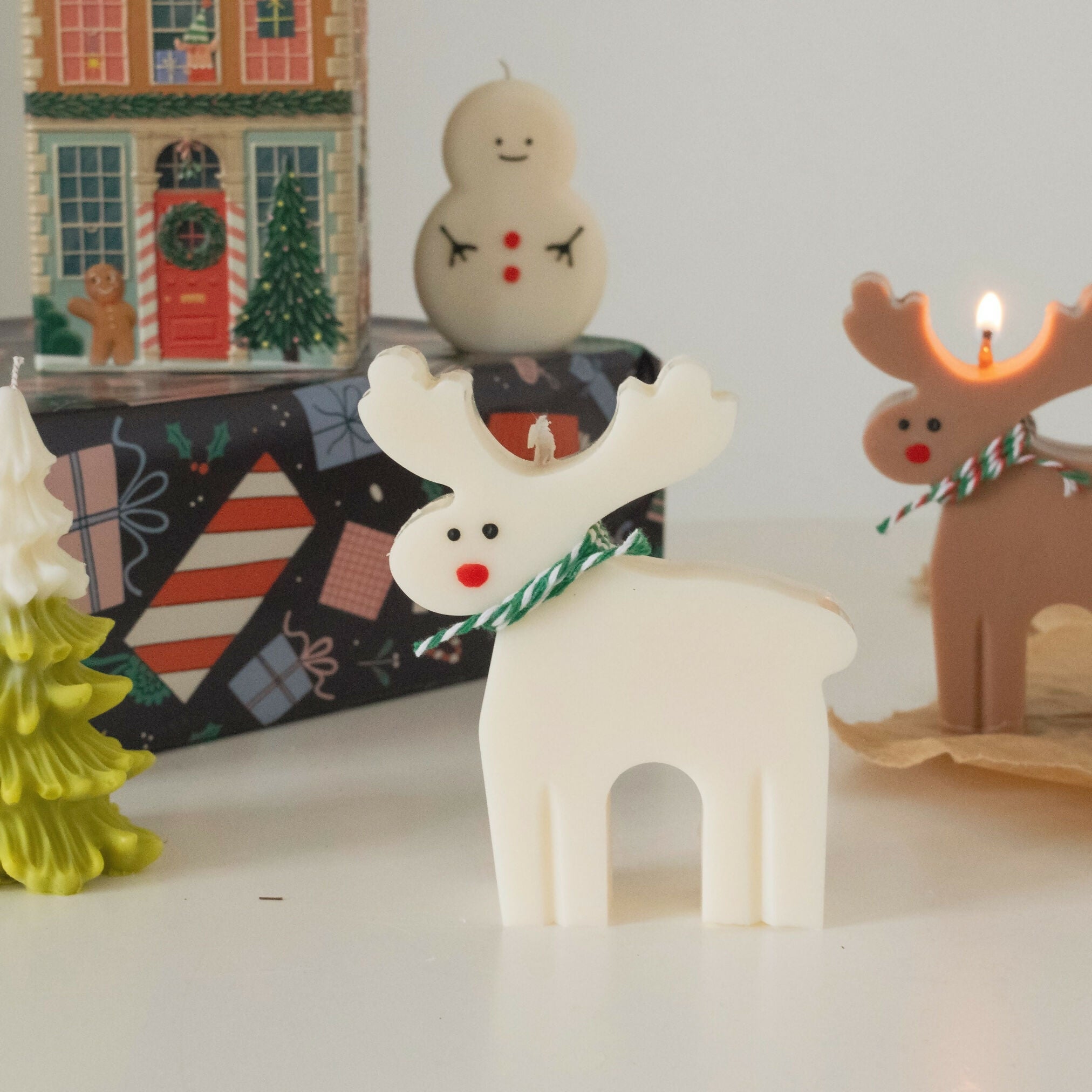 white reindeer candle