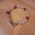 Tibetan silver Toggle Catch Bracelet with Rose Quartz, Tibetan silver spacer Beads and Strawberry Quartz.