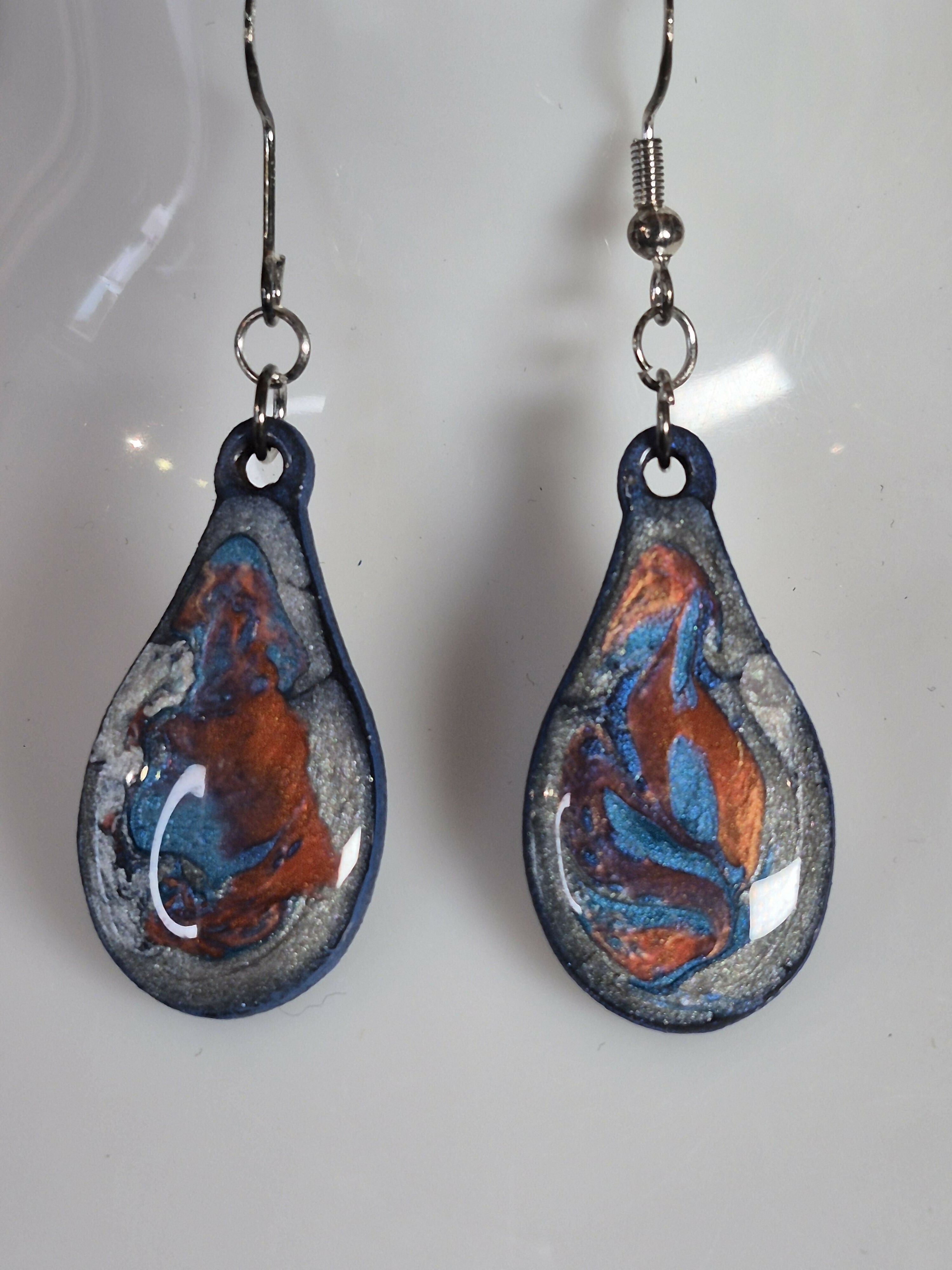 Handcrafted Teardrop Earrings With Blue, Silver And Red Colours