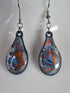 Handcrafted Teardrop Earrings With Blue, Silver And Red Colours