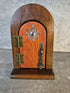 Handcrafted round arch opening wooden fairy door.