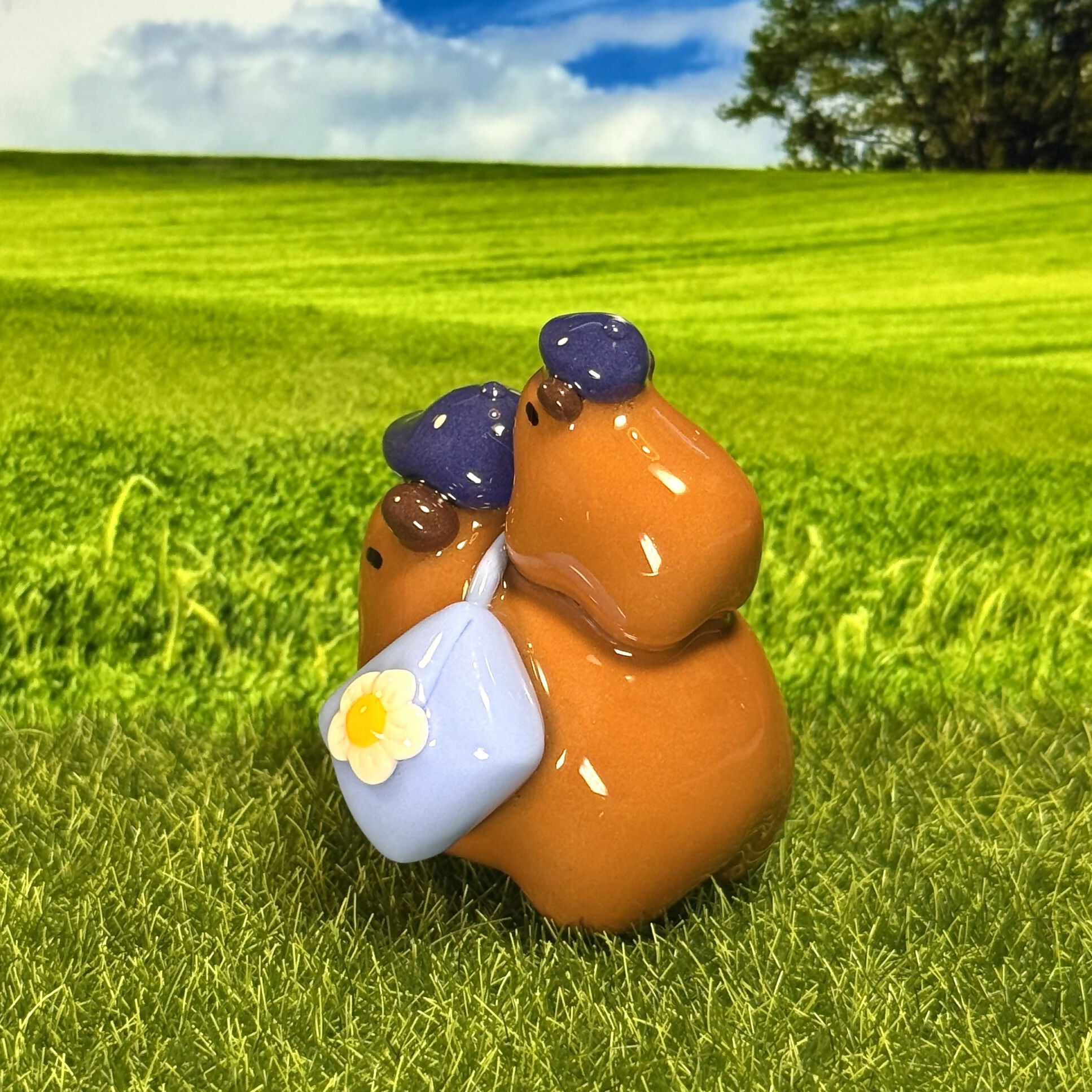 Sassy Capybara Duo With Flower Bag Figure