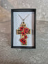 Handcrafted and engraved red poppy cross.