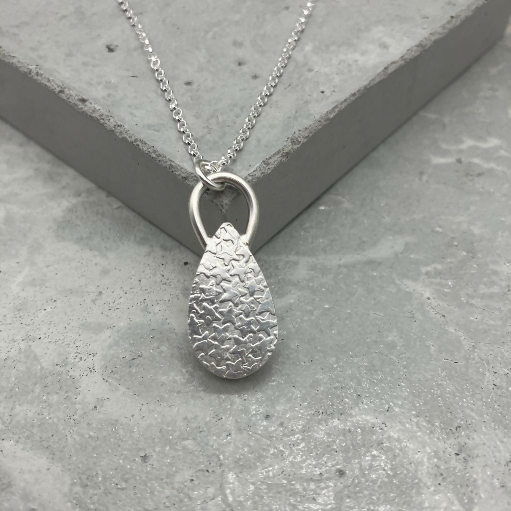 Rainbow Moonstone Teardrop Shaped Silver Pendant
