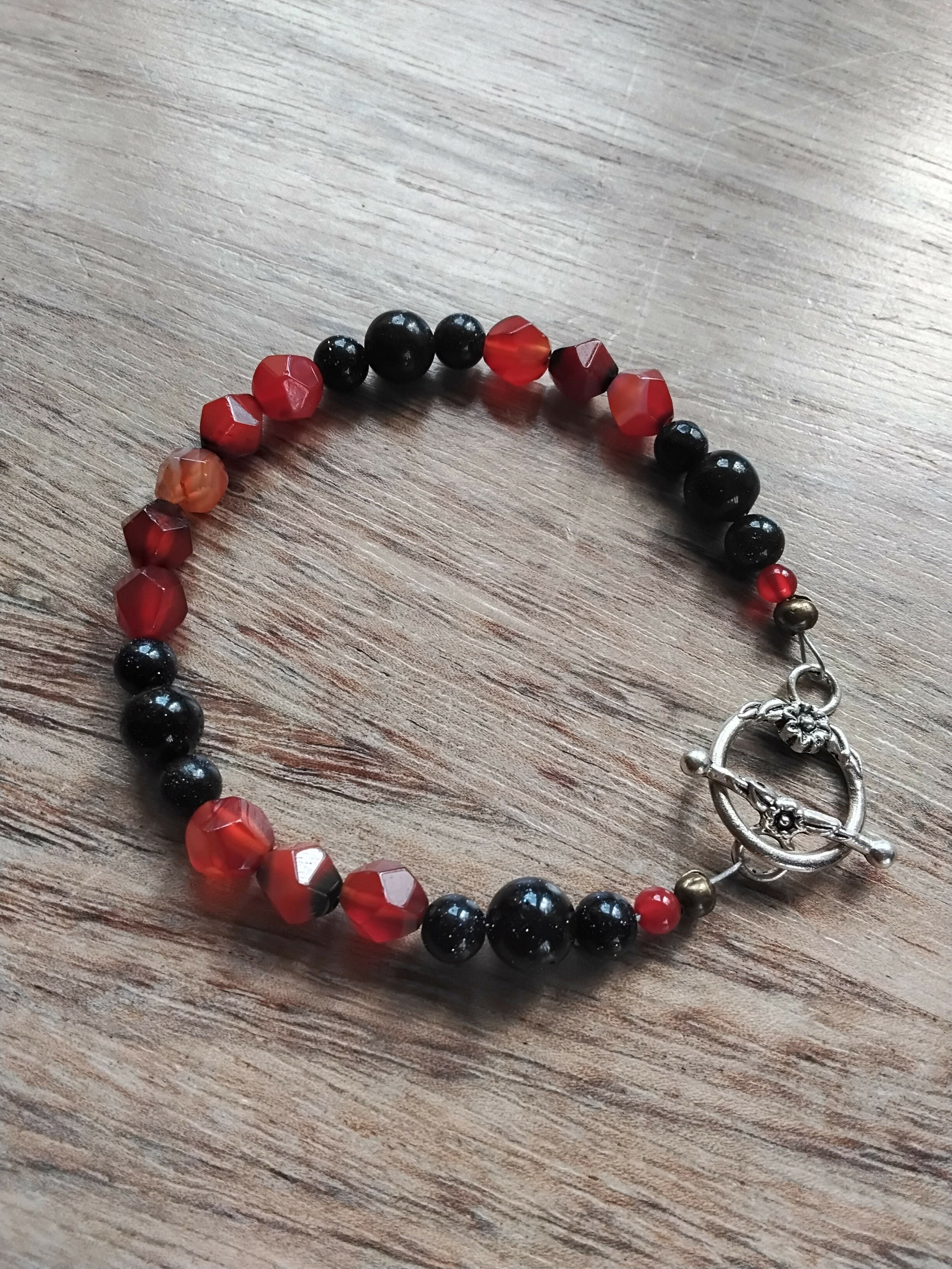 Tibetan Silver Toggle Catch Bracelet with Carnelian, Navy Goldstone & Faceted Carnelian.