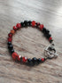 Tibetan Silver Toggle Catch Bracelet with Carnelian, Navy Goldstone & Faceted Carnelian.