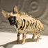 Ceramic striped hyena sculpture