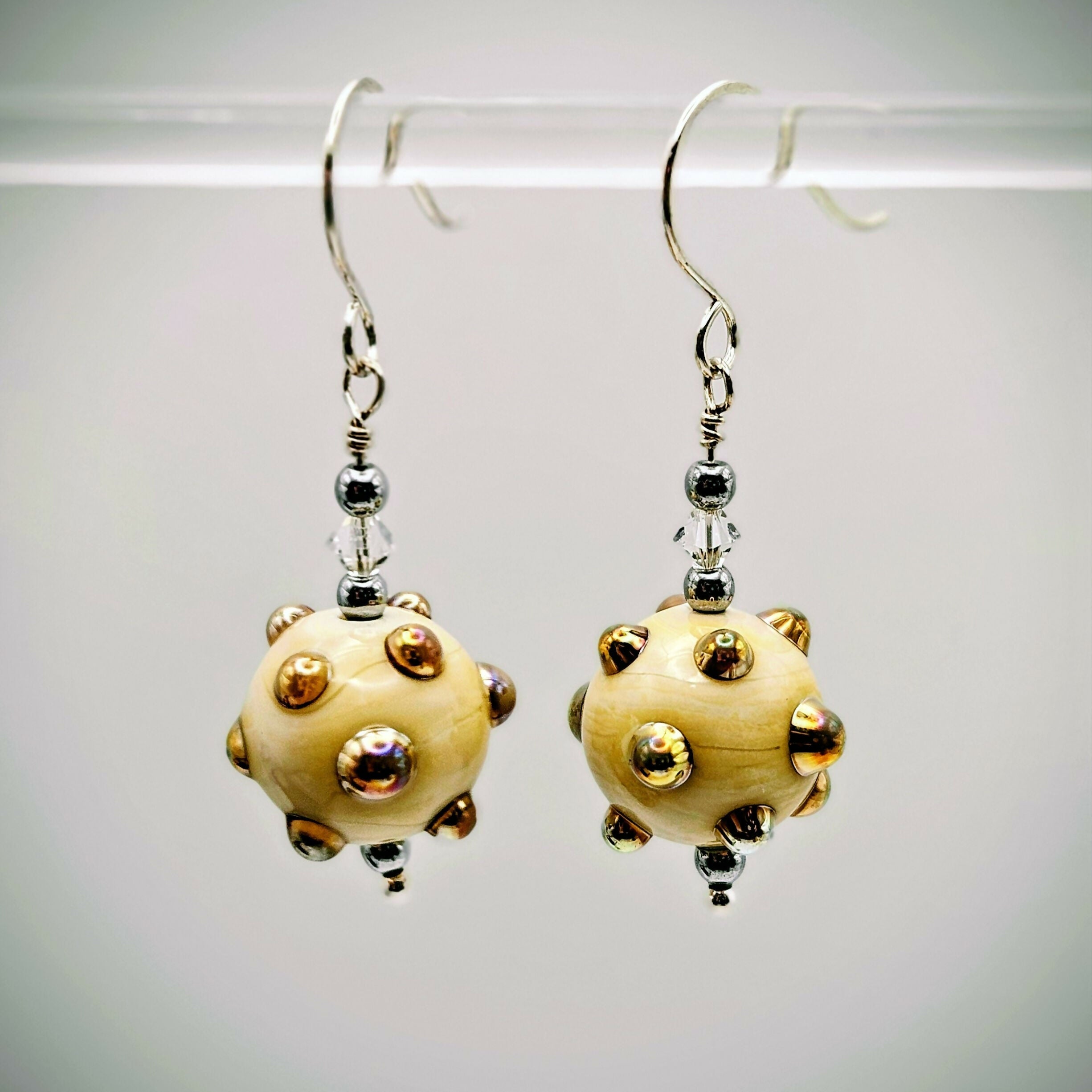 HAND LAMPWORKED GLASS EARRINGS WITH GOLD LUSTER BOBBLES, WITH STERLING SILVER EAR WIRES AND SWAROVSKI CRYSTALS.