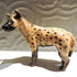 Ceramic spotted hyena sculpture