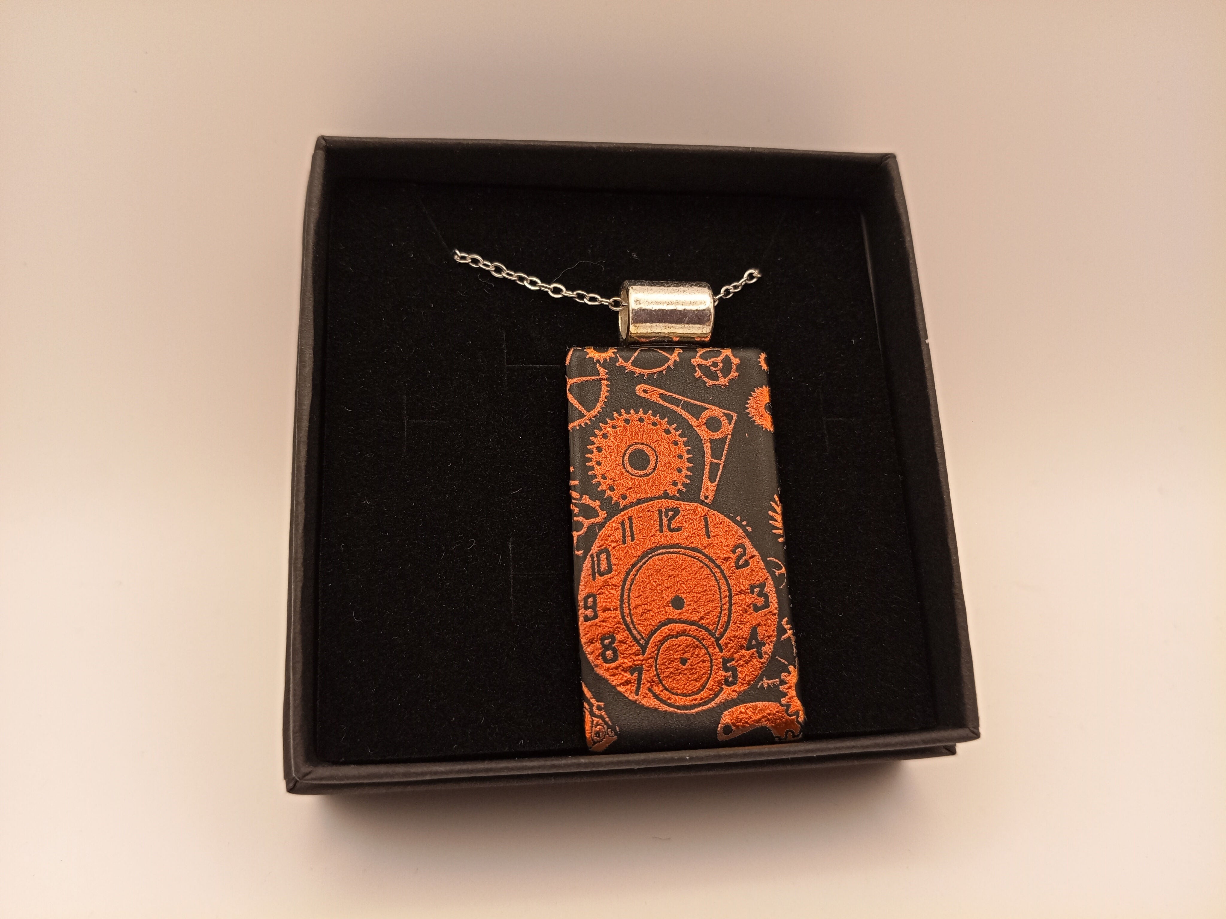 Orange and Black Steampunk Pendant