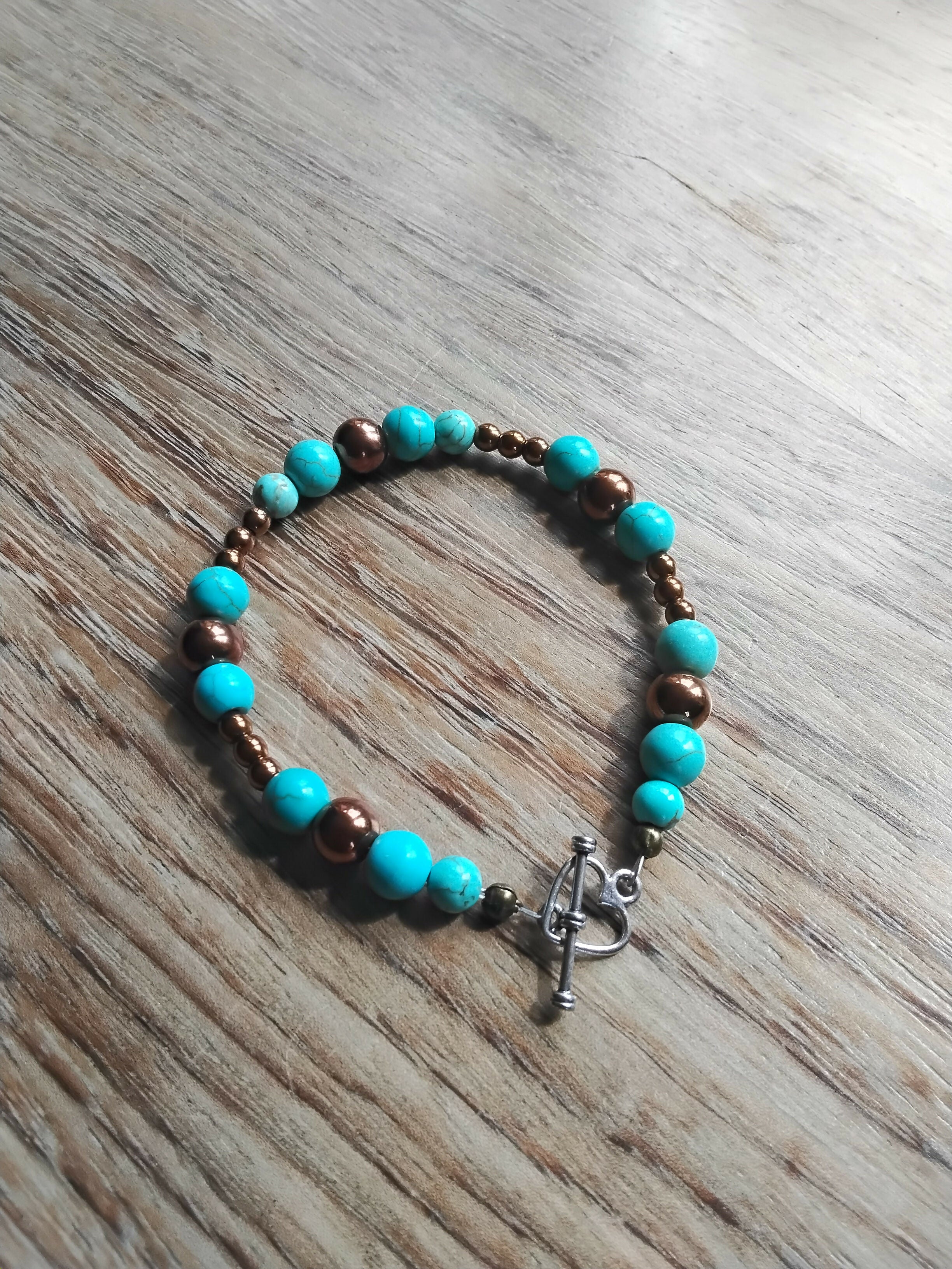 Tibetan Silver Toggle Catch Bracelet with Turquoise and Copper Hematite.