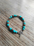 Tibetan Silver Toggle Catch Bracelet with Turquoise and Copper Hematite.
