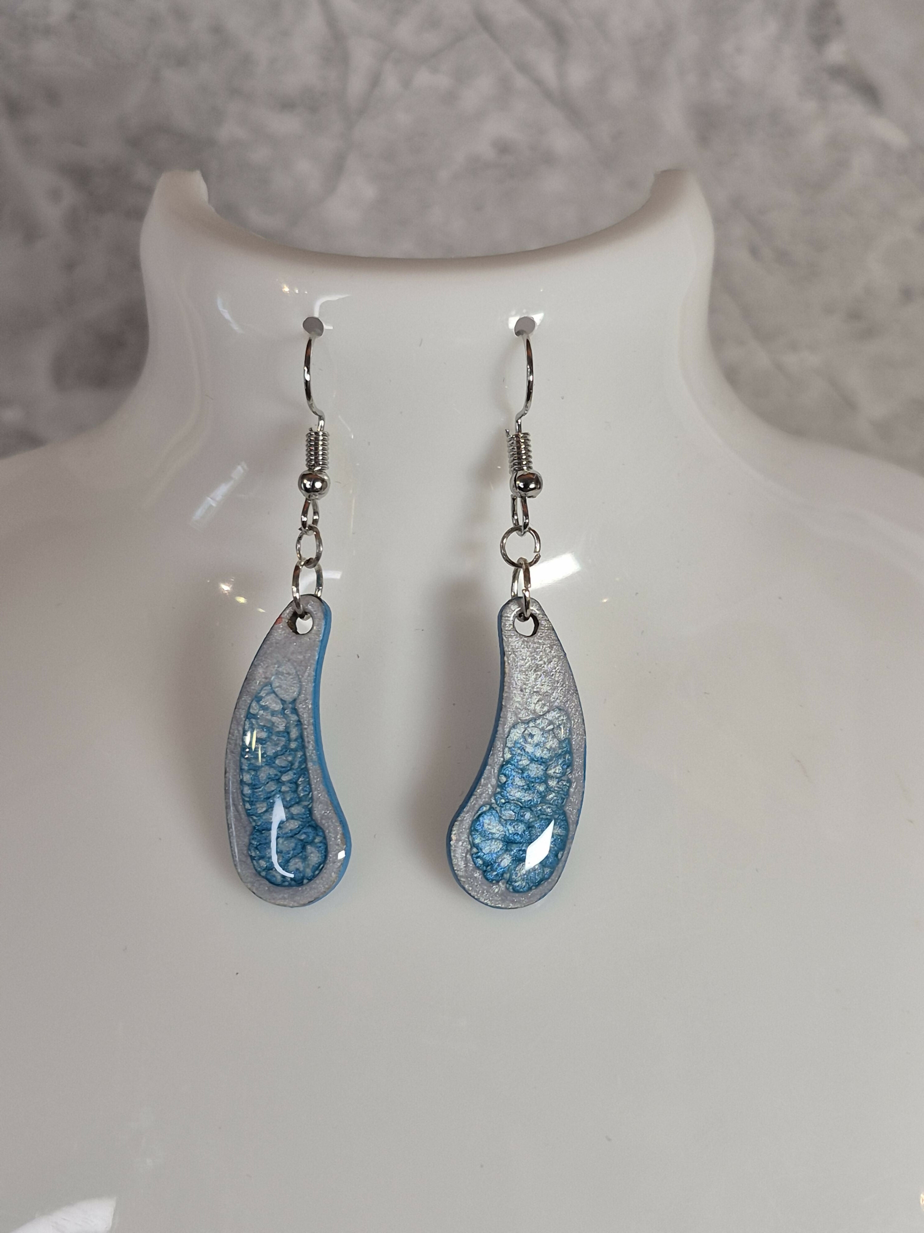 Handcrafted Teardrop Shaped Silver And Cyan Earrings