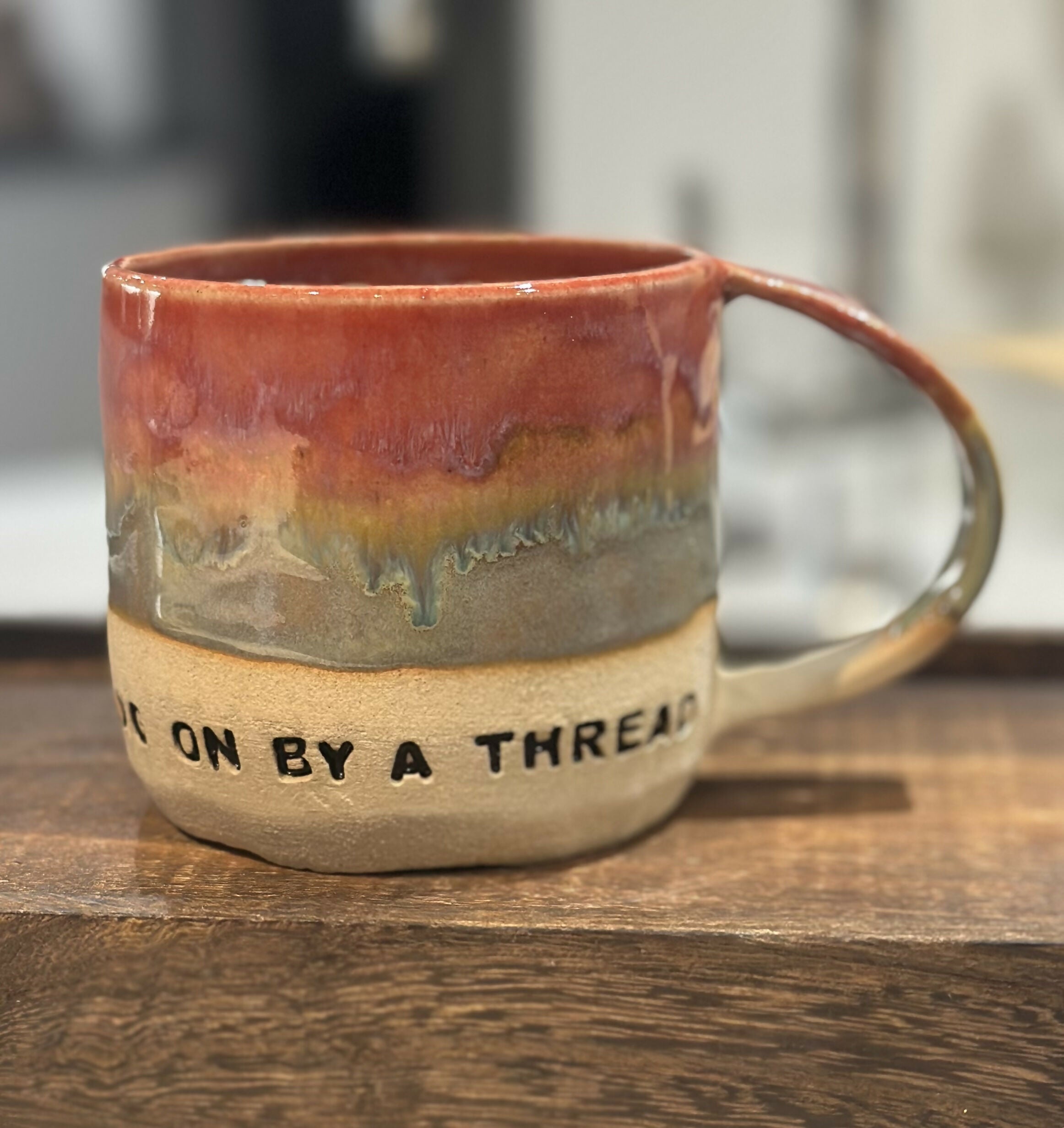 HANG ON BY A THREAD RED/GREEN MUG