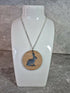 Unique Handcrafted Round Pendant Showing a Seated Hare