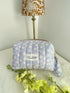 Lilac white flower print Quilted Toiletry Bag