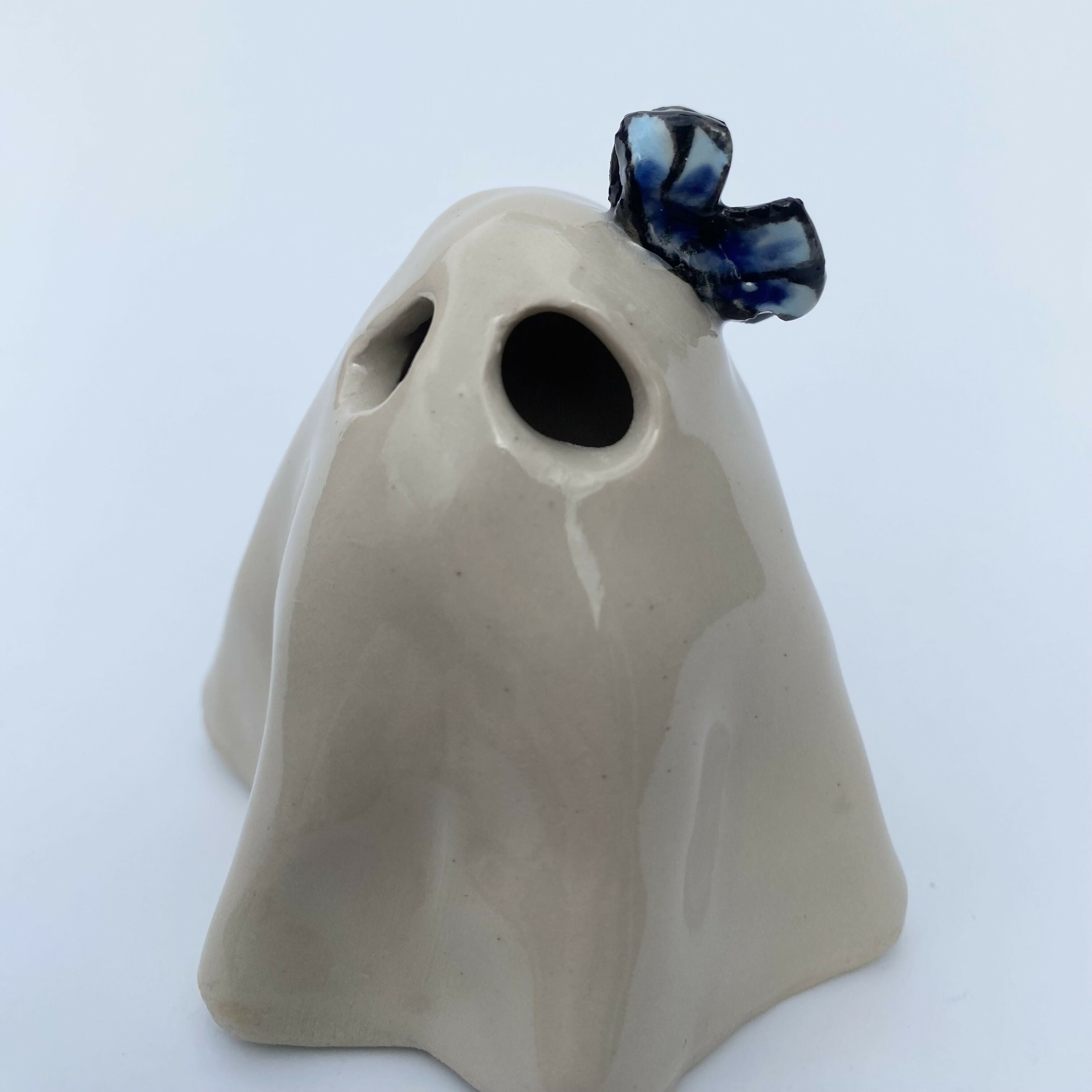 Handmade Ceramic Ghost Ornament With A Blue Butterfly