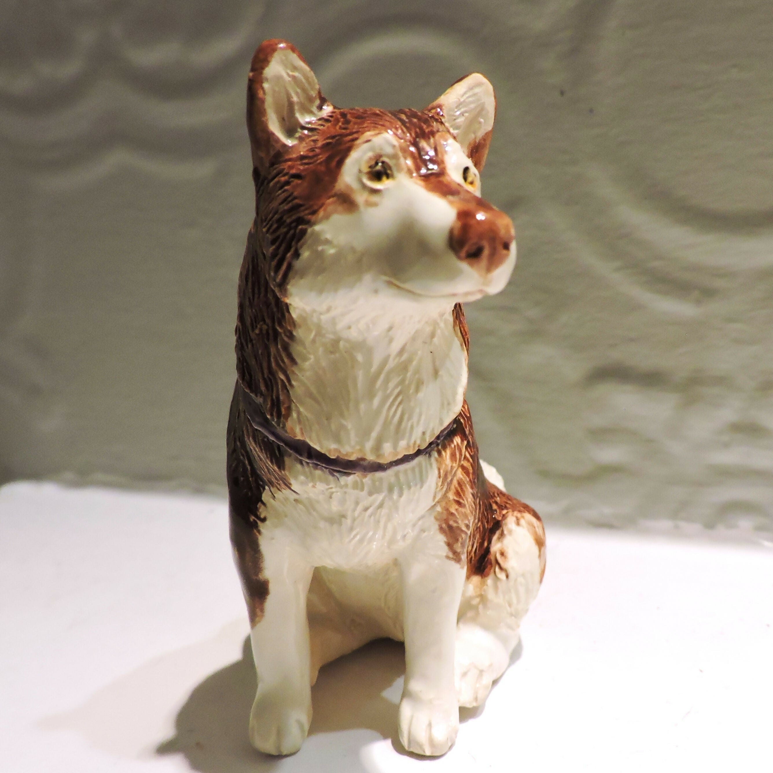 Ceramic husky dog sculpture