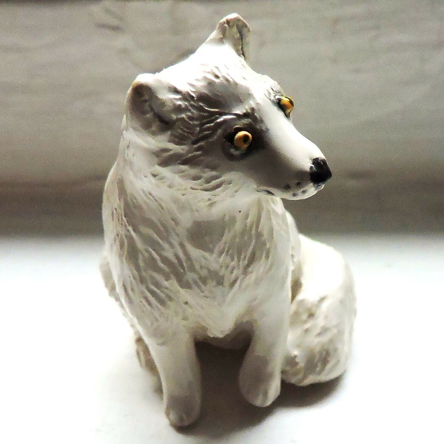 Ceramic Arctic fox sculpture
