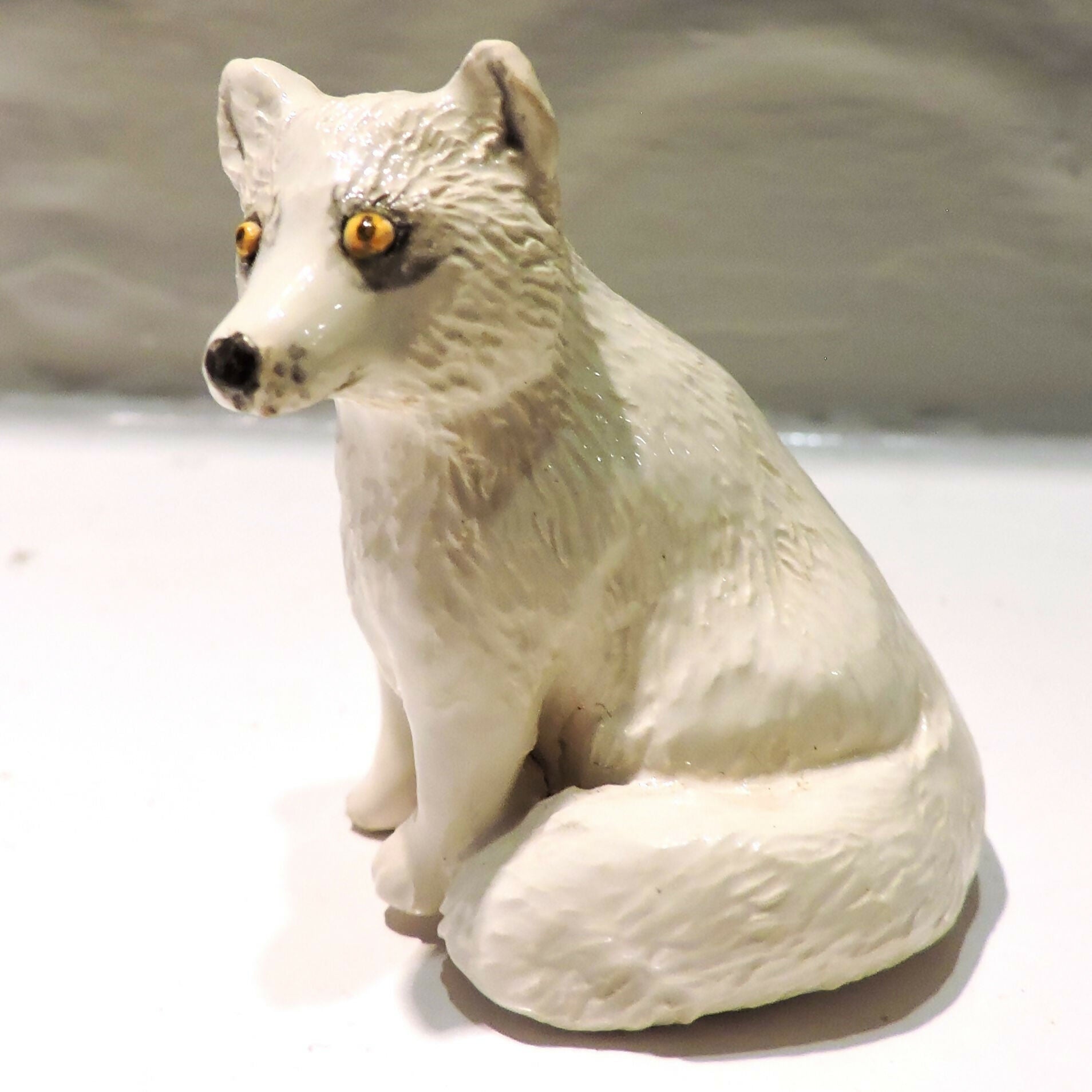 Ceramic Arctic fox sculpture