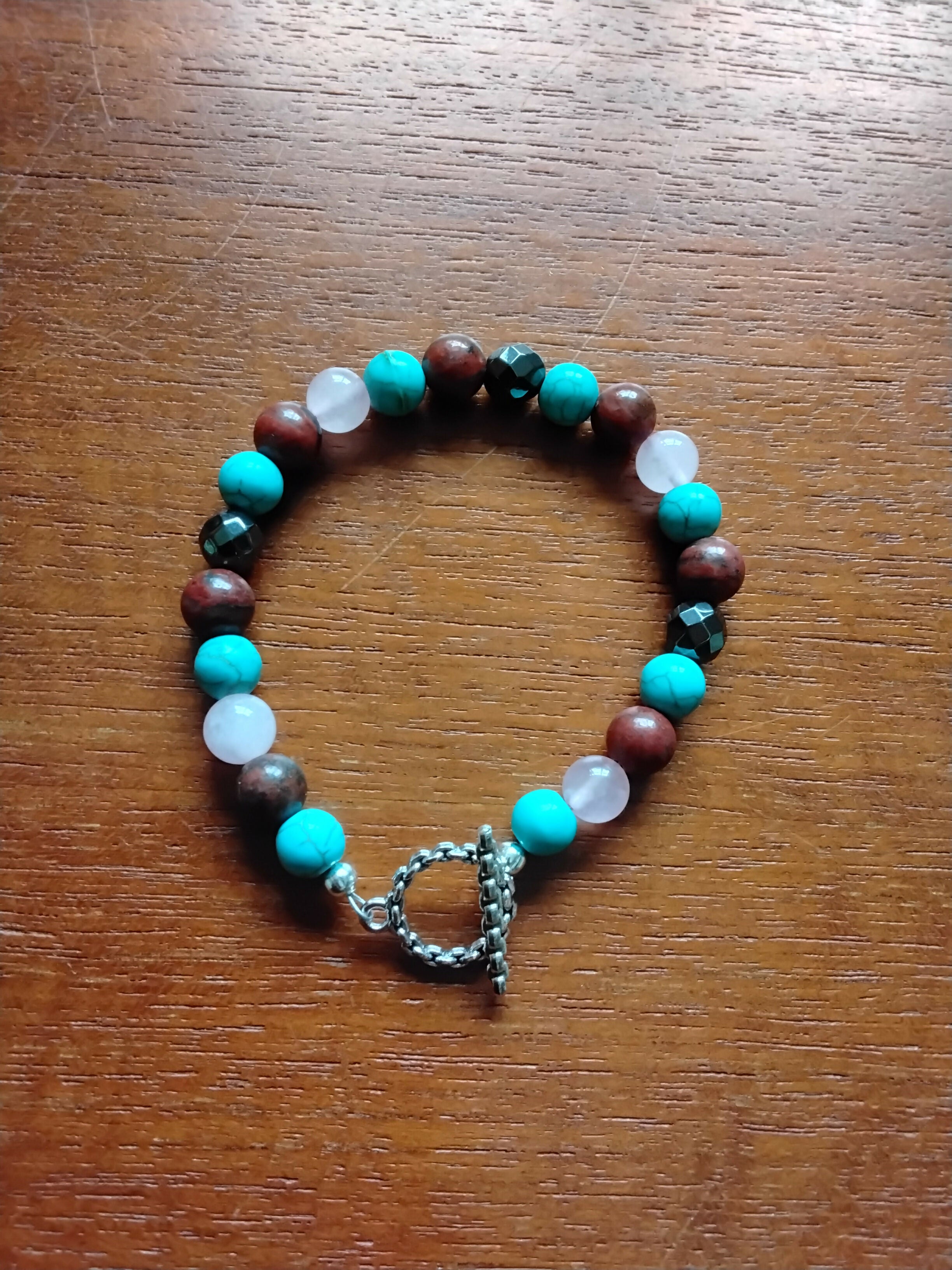 Tibetan Silver Toggle Catch Bracelet with Turquoise, Rose Quartz, Red Sesame Jasper & Faceted Grey Hematite.