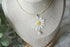 White Daisy Flower with Pearl Necklace