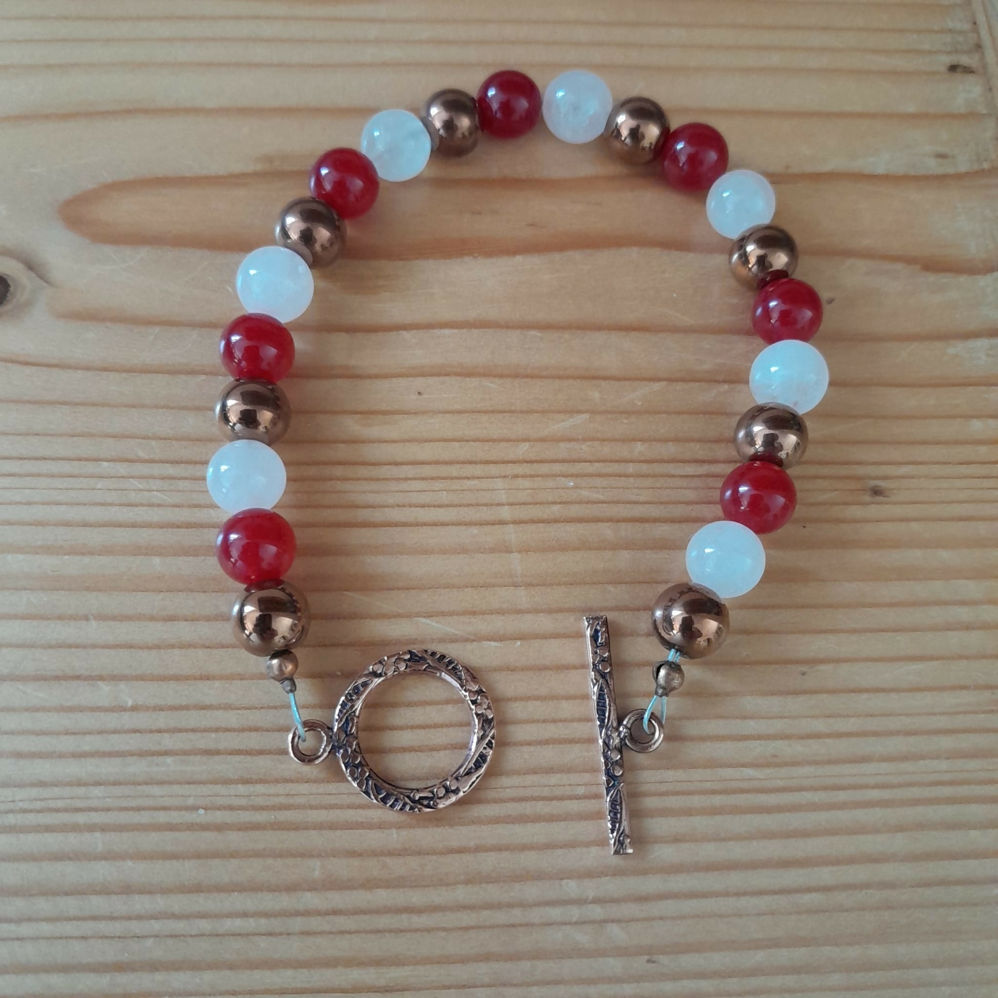 Pure Copper Toggle Catch Bracelet with Bronze Hematite, Red Chalcedony and Rose Quartz.