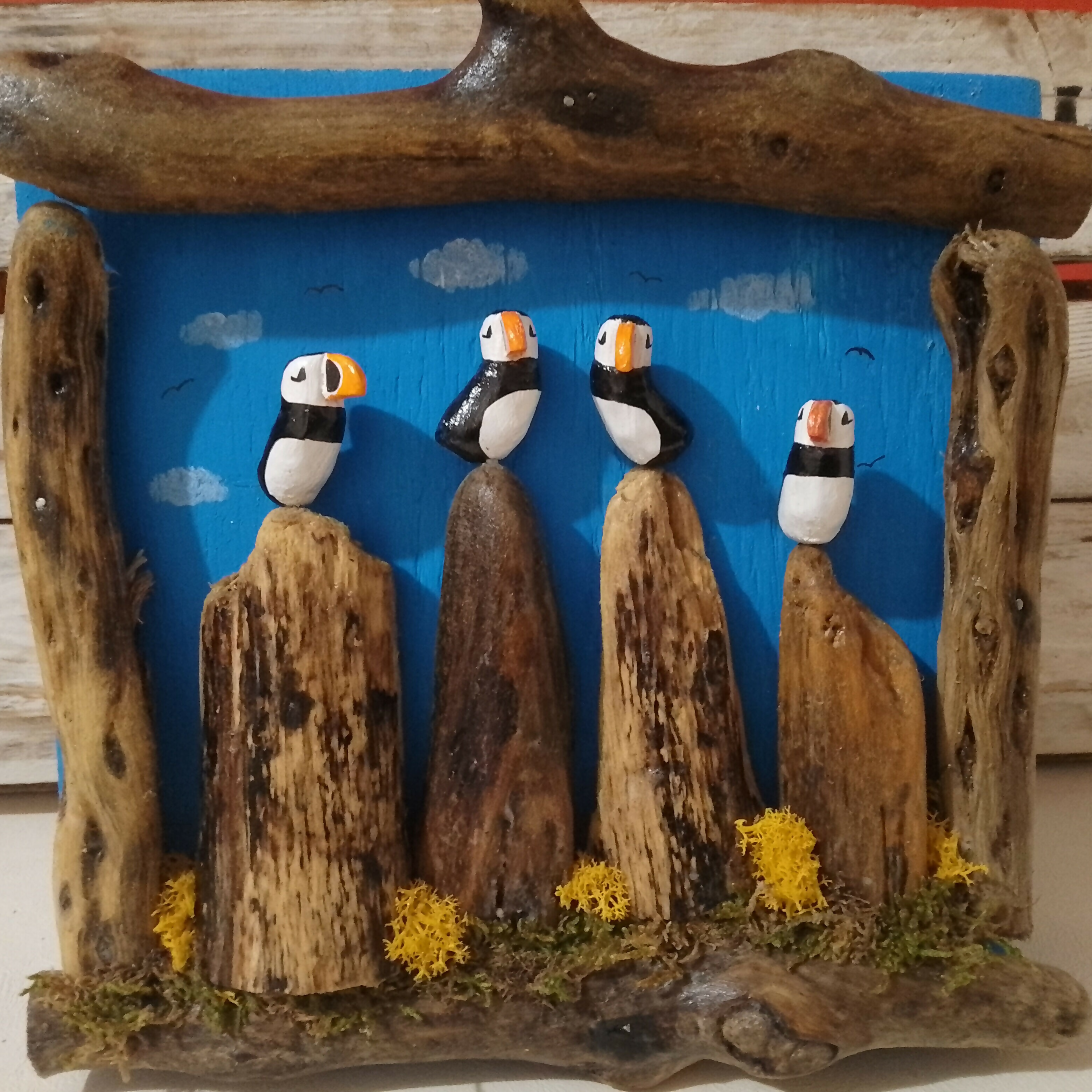 Large Wooden Frame: 4 Puffins, sky Blue Background