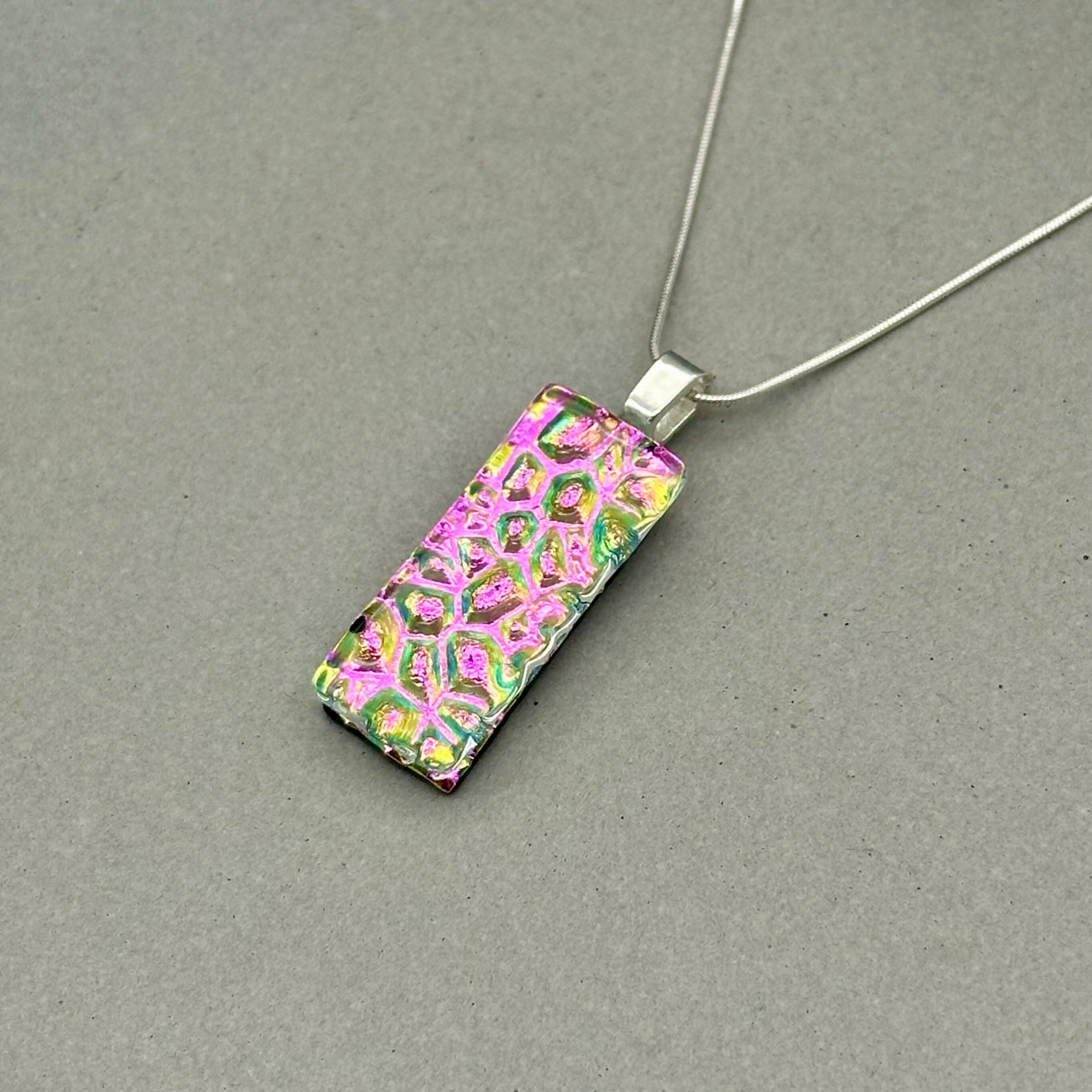 Pink Raindrop Dichroic Fused Glass Pendant with Silver Plated Chain - Handmade by Jade Tapson Glass.