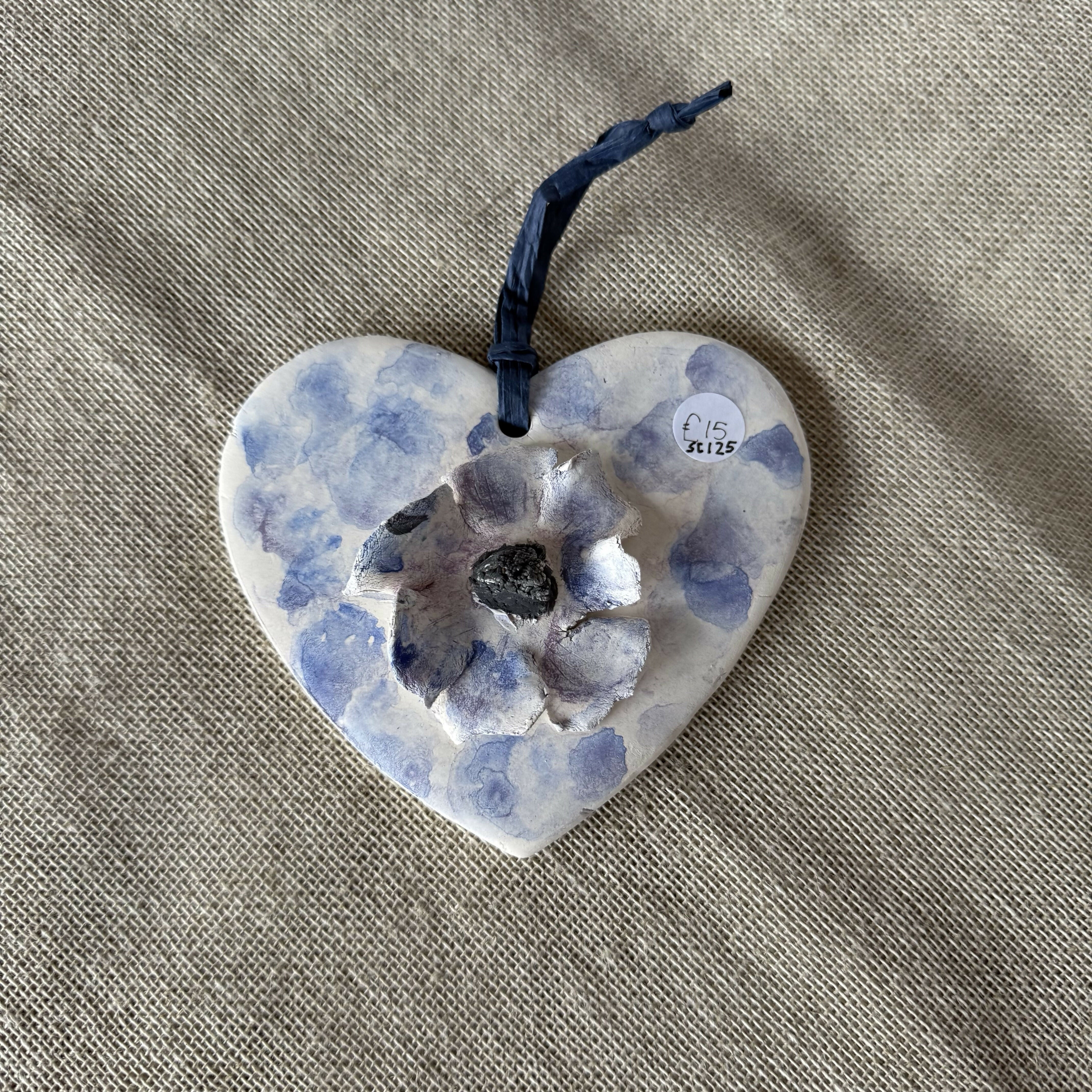CERAMIC 3D HANGING HEART WITH FLOWER EMBELLISHMENT